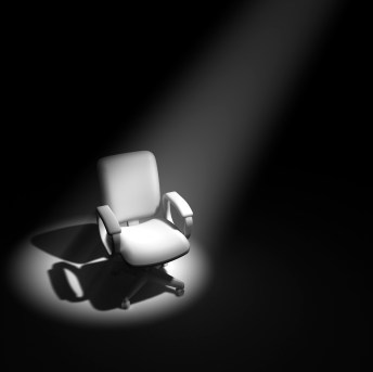 3d Office chair in spotlight